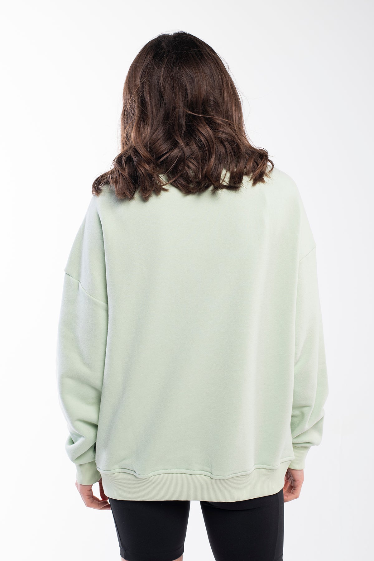 Pastel mint green balance stones sweatshirt with a round neck is classy and timeless
