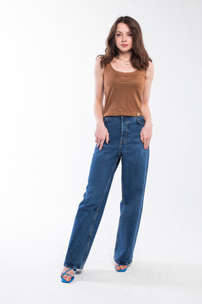 This top features a cropped length and a soft, knitted material in brown.