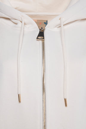 Oversized full-zip hoodie with gold zipper in rice white.