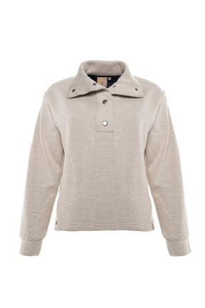 High neck buttoned sweater with side buttons in white beige.