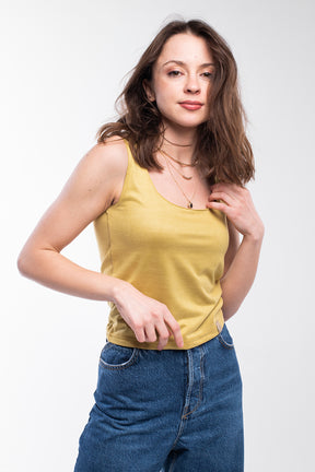 Golden yellow soft-feeling knit top for women.
