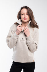 Warm and comfortable high neck buttoned sweater in beige white.