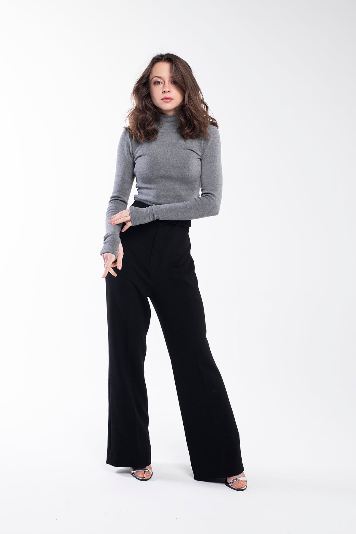 Grey fine-knit turtleneck sweater for women.