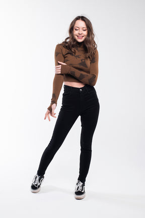 Brown fine-knit turtleneck sweater for women.